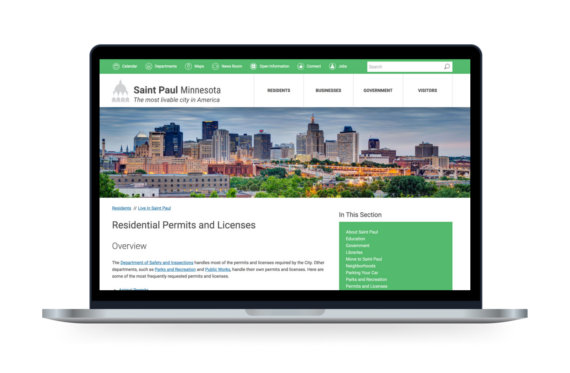 The City of St. Paul Permits and Licenses webpage displayed on a laptop
